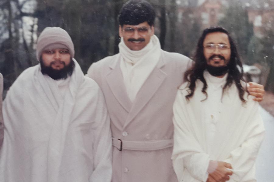 Brahmachari Girish Ji walking with Pt. Gopal Krishna Dave and Ved Prakash Sharma in forest near MERU, Holland, winter 1993